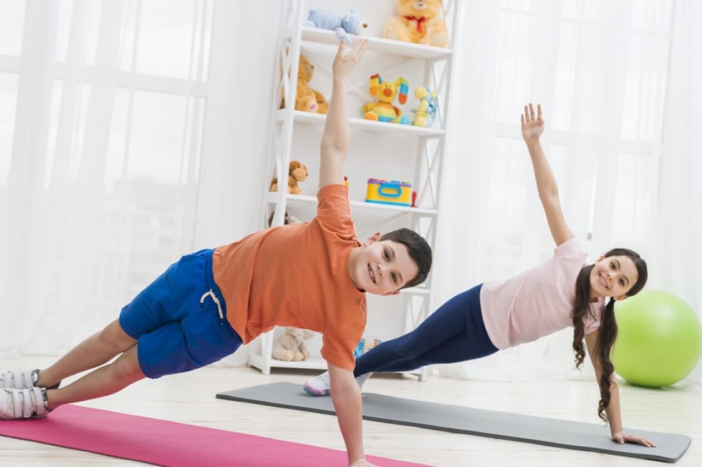 Children are exercising during the lesson of physical education